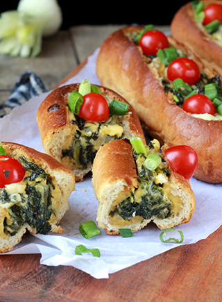 Bread boats filled with spinach eggs Del Monte Sandwich spreadÂ 